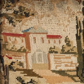 A needlework of a white stone building with a blue and red roof.